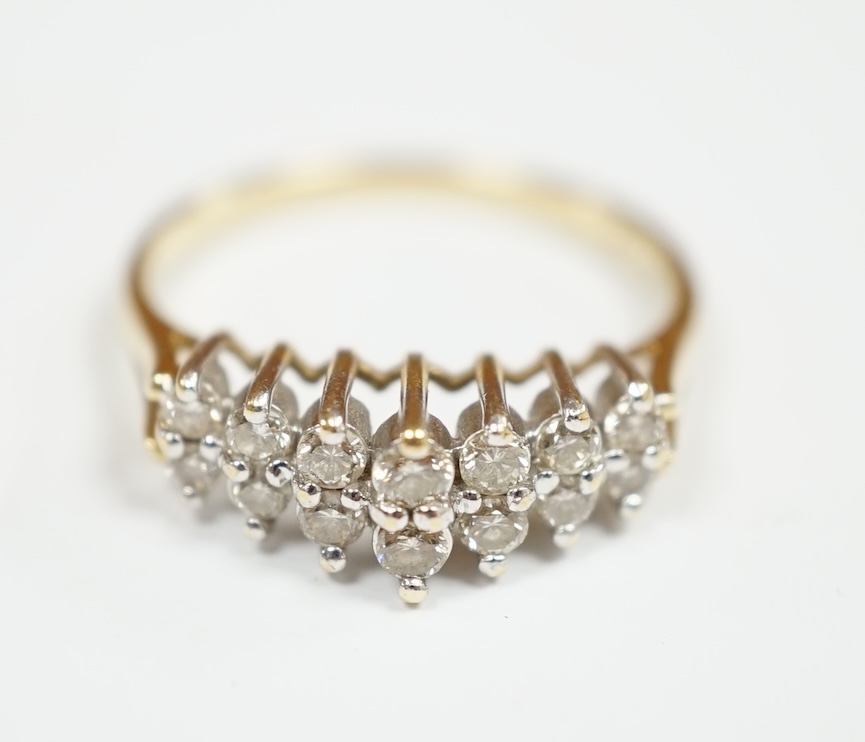 A modern 14k and diamond cluster set two row ring, size O, gross weight 2.9 grams. Condition - fair to good